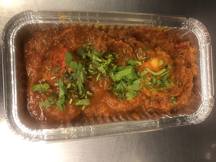Simla curry dish, slow-cooked and garnished with coriander